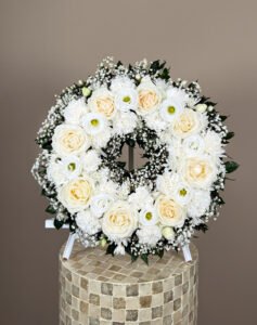 Funeral wreath with fresh seasonal flowers sympathy tribute Gold Coast florist