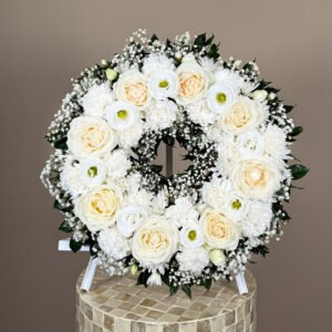 Funeral wreath with fresh seasonal flowers sympathy tribute Gold Coast florist