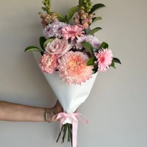 Small Mother’s Day bouquet Gold Coast florist with gerberas, rose, carnations and chrysanthemums wrapped for delivery.