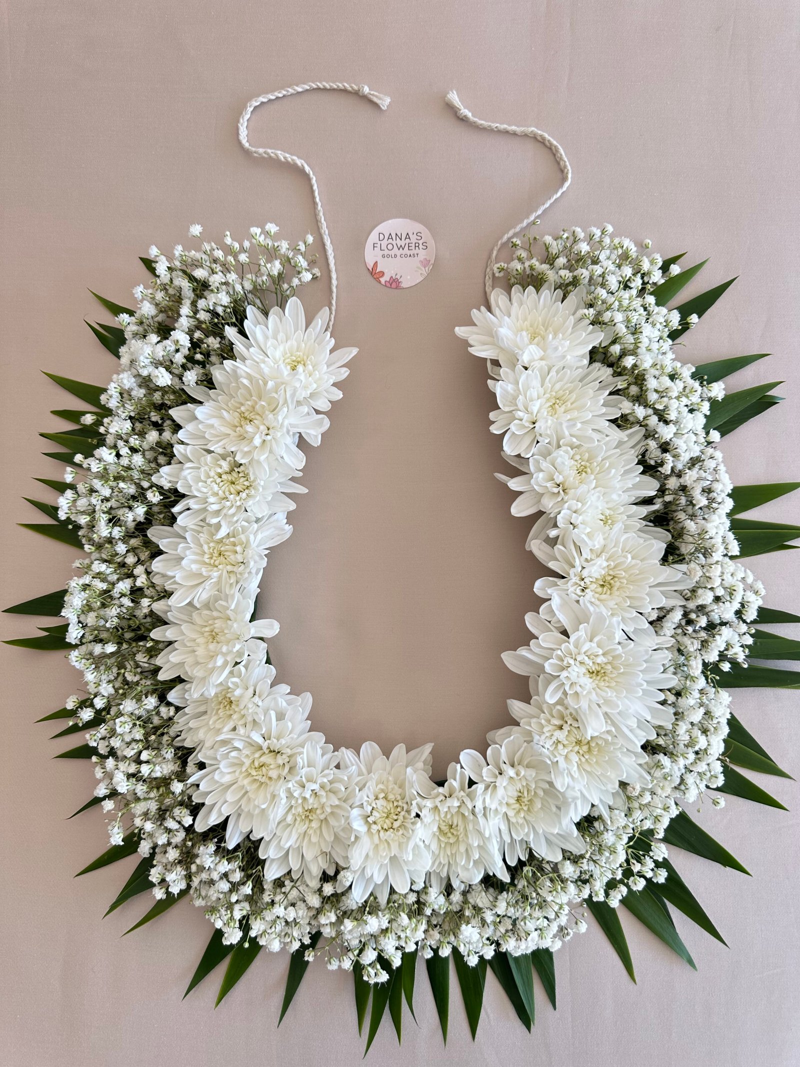 Fresh flower lei necklace with blooms for special occasions and celebrations